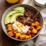 hot honey beef bowl on rustic table